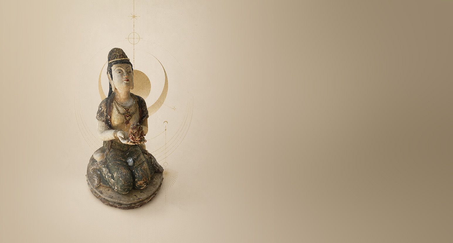Serene seated Buddha figure in soft golden light